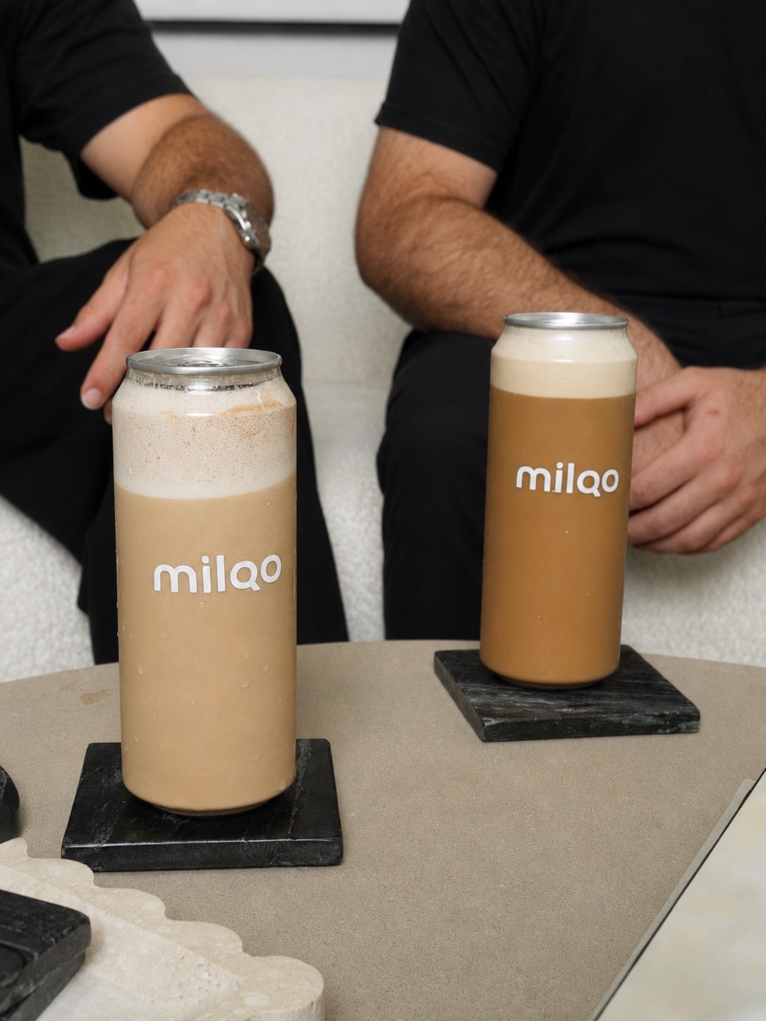 milqo iced latte cans sitting together